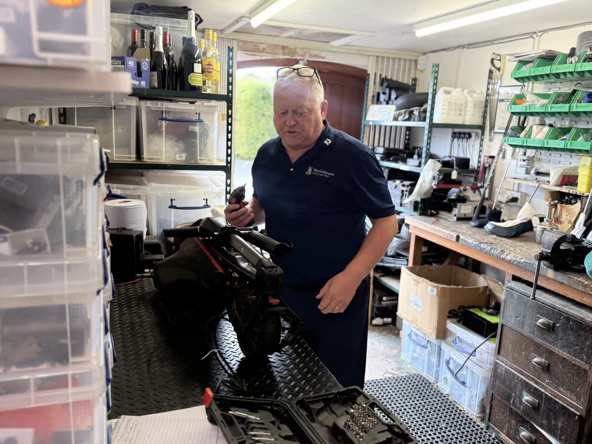 Fraser Hughes at the workshop bench