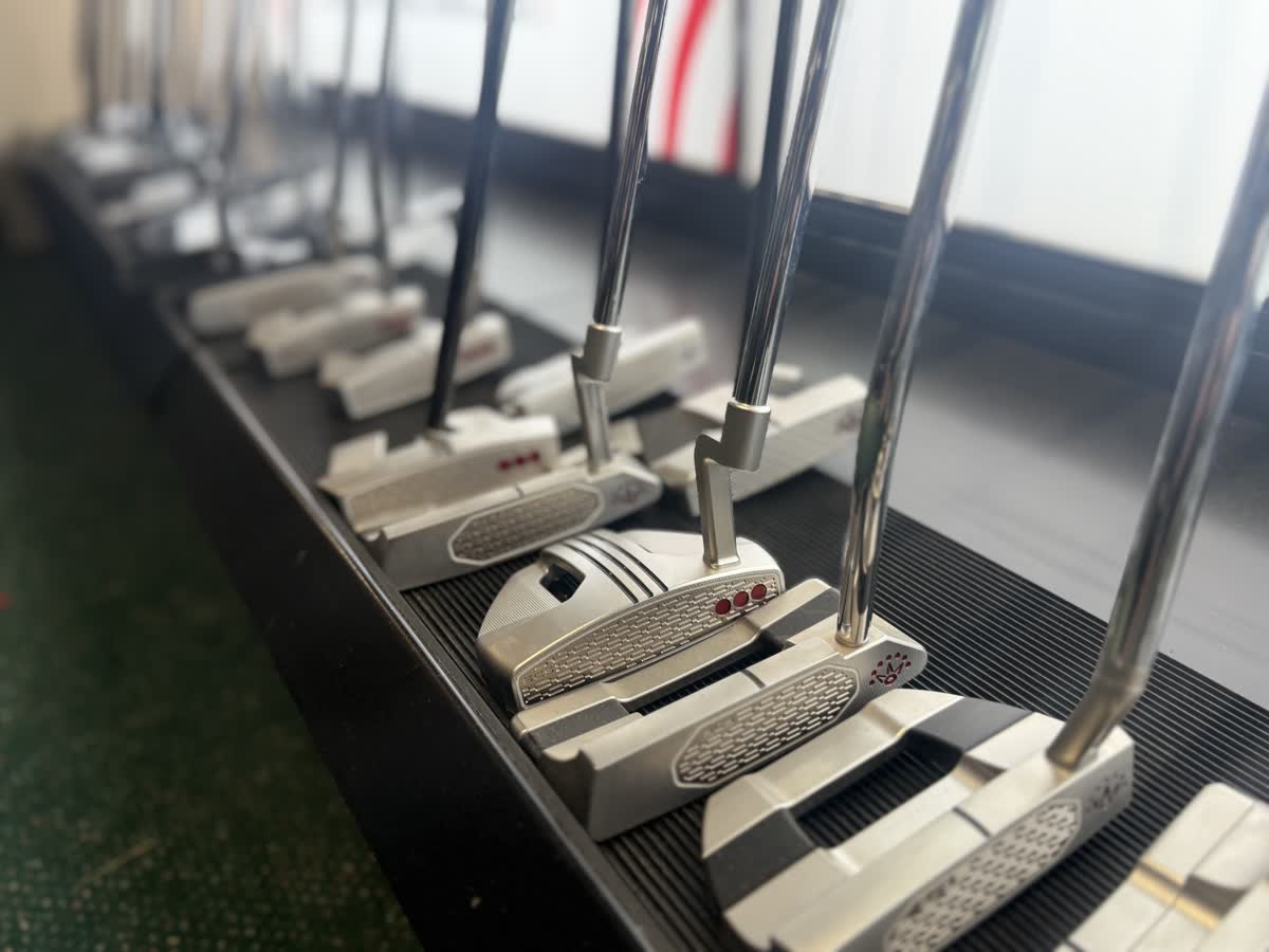Rack of putters in the professional shop