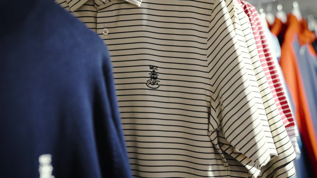 Crest embroidered on a golf sweater in the professional shop